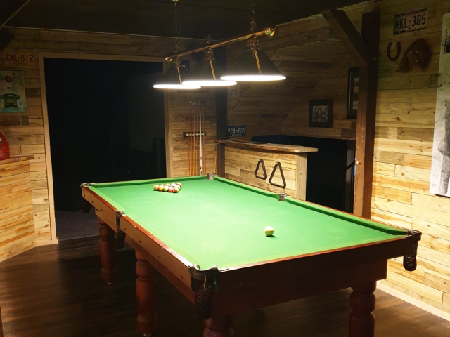 Bluegum Timber Slab used for this bar top and pool room lined with timber throughout. Timbers available from Tradeware Building Supplies Brisbane
