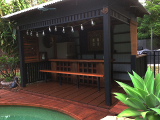 Pool Gazebo featuring the beautiful Spotted Gum Slabs, wide Merbau Decking, Big End Section Hardwood Posts available from Tradeware Building Supplies Brisbane.