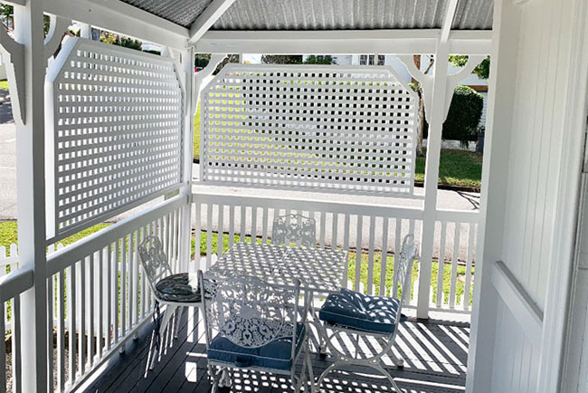 White timber lattice for privacy screen on front verandah from Tradeware Building Supplies